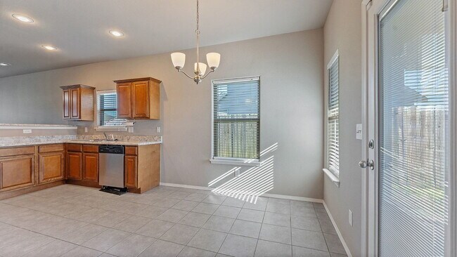 Building Photo - Spacious 4-Bedroom with Elegant Granite Finishes