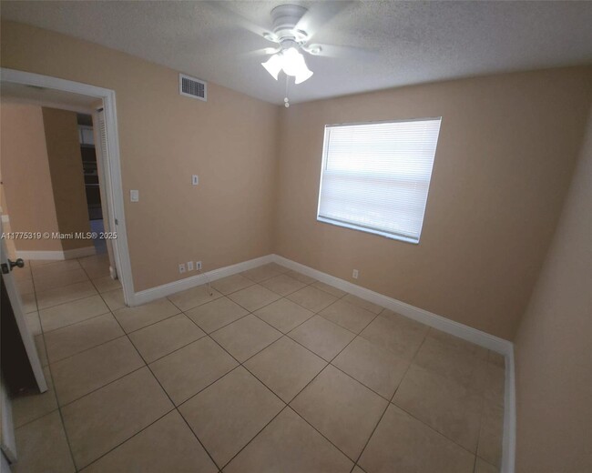 Building Photo - 8750 Royal Palm Blvd