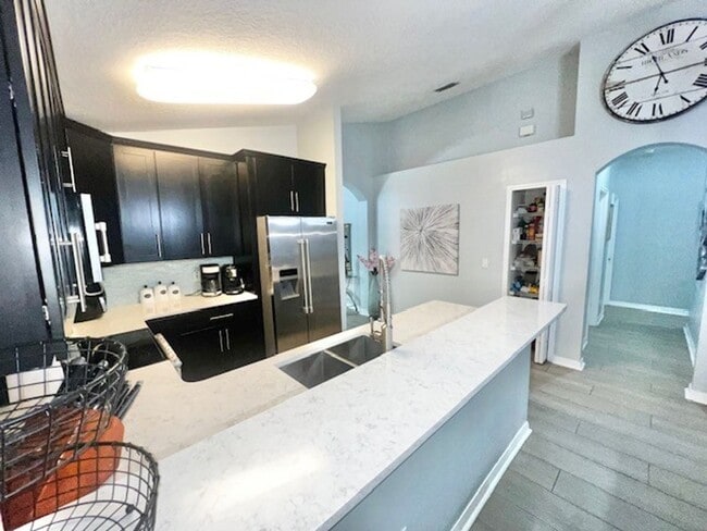 Building Photo - Amazing 4x2 in Lake Nona!! Gated Nona Crest! All tile flooring!! 2 car garage!