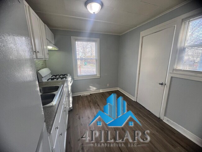 Building Photo - Charming 2 Bedroom Duplex in La Porte with Spacious Layout and Prime Location