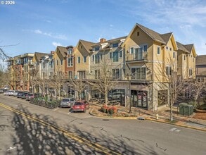 Building Photo - Main Street Living with Granite Kitchen, Gas Fireplace, and MAX Line Access