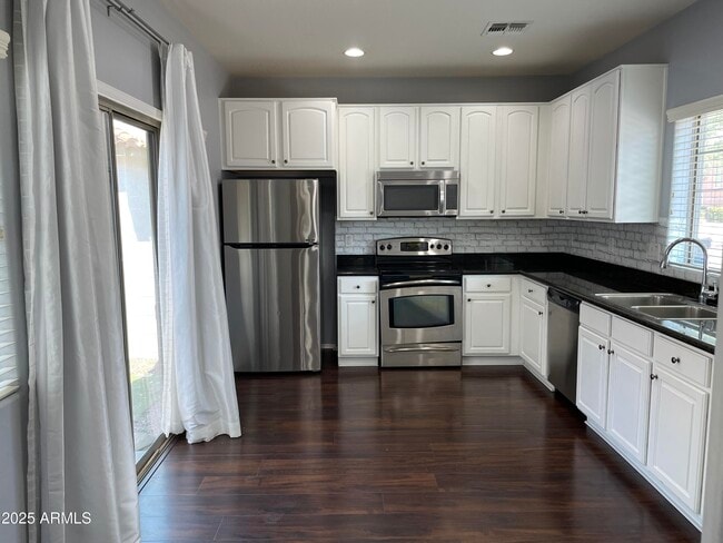 Building Photo - 14240 W Country Gables Dr