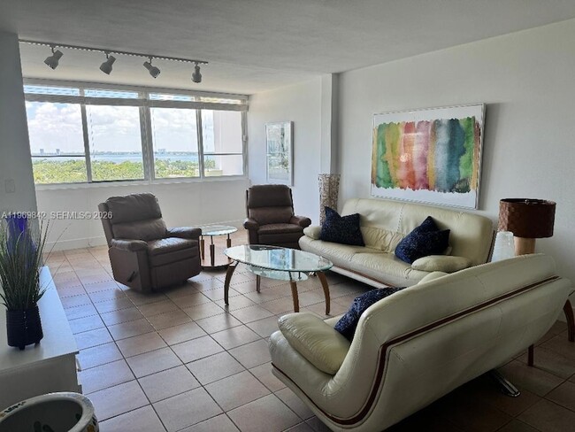 Building Photo - 5005 Collins Ave