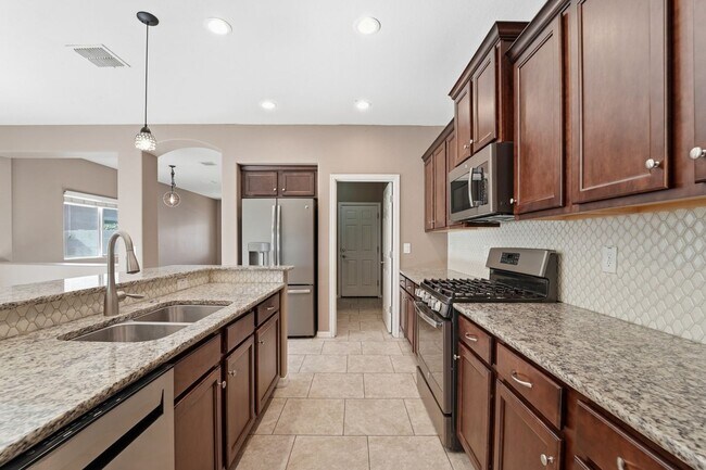 Building Photo - Ironwood Crossing Gem! 3 Bed + Den, Open Layout & Resort Amenities