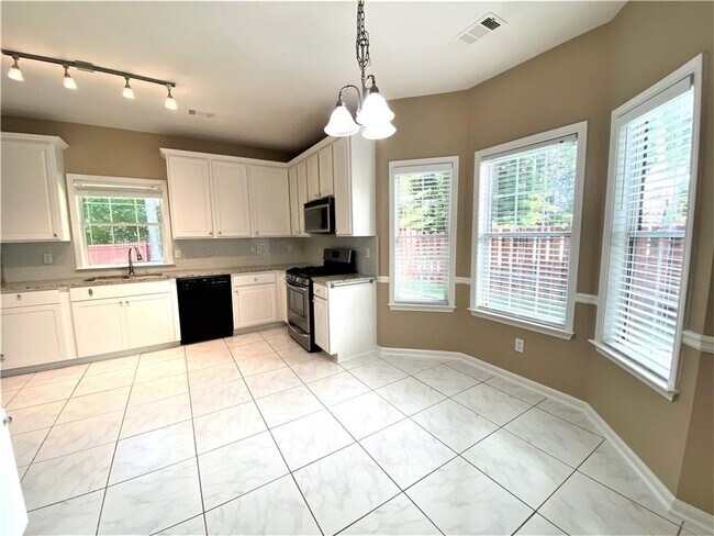 Building Photo - 4890 Weathervane Dr