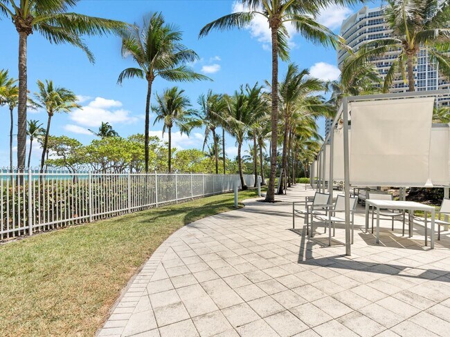Building Photo - 10275 Collins Ave