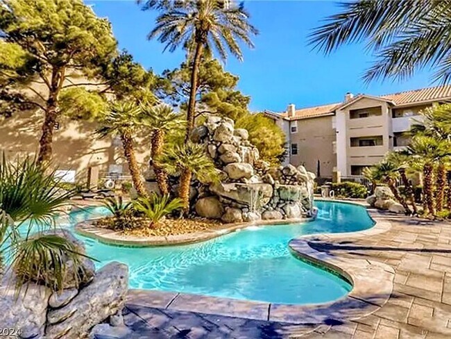 Building Photo - AWESOME 2 BEDROOM  CONDO NEAR STRIP W/ VIEWS AND OVERLOOKS POOLS!!!!!!