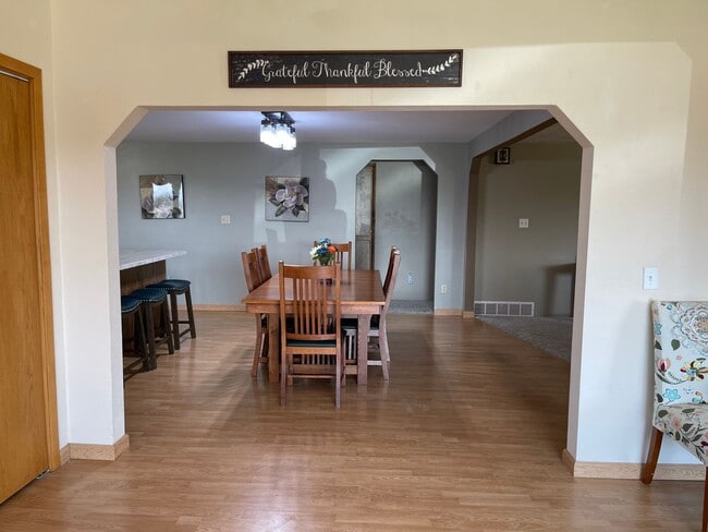 Building Photo - Spacious, four-bedroom, two-bathroom, coun...