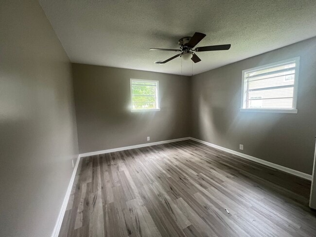 Building Photo - Three bedroom home with XL garage!