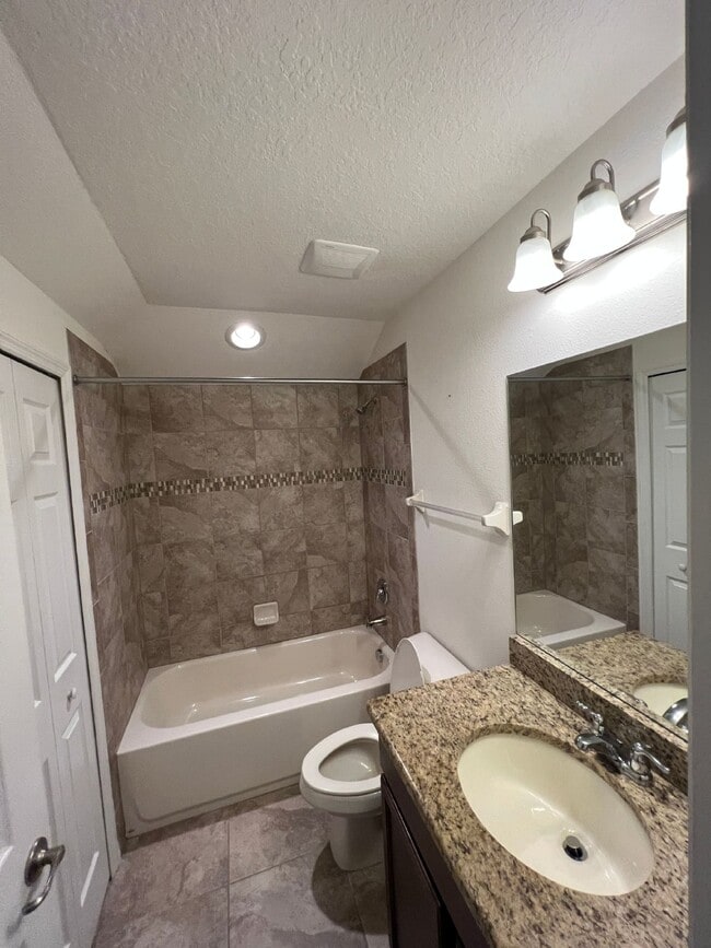 Building Photo - "Spacious 4-Bedroom Lutz Home with Elegant...