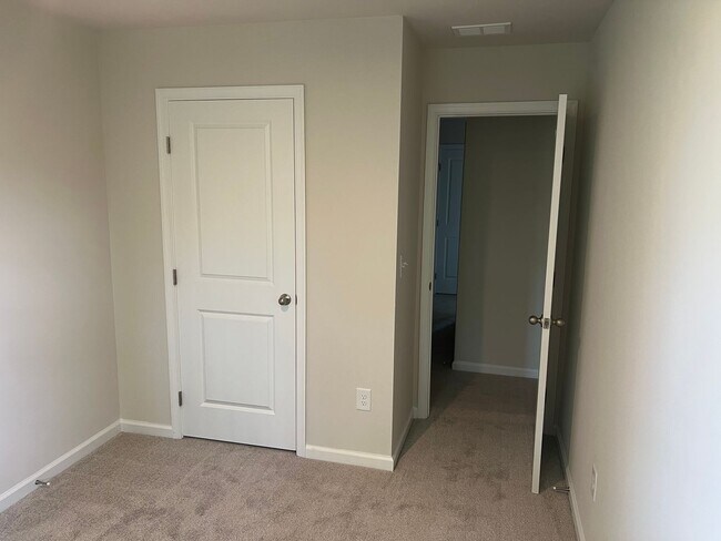 Building Photo - New Three-Bedroom, Two and one-half Bath T...