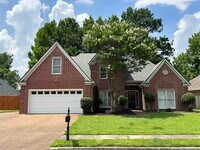 Building Photo - 8570 Meadow Green Dr