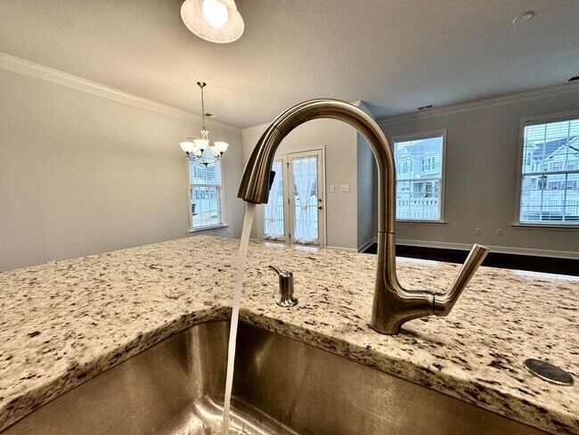 Building Photo - A 1st-Time Rental Available NOW! 3/3.5 Newer End-Unit Townhome w/Garage - Landscaping Included!