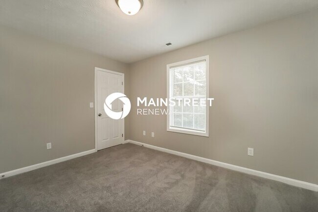 Building Photo - 4 Bedroom Pet-Friendly Home in Rex, GA with Main Street Renewal
