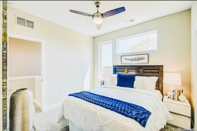 Experience tranquility in this beautifully designed bedroom oasis. - Harley House