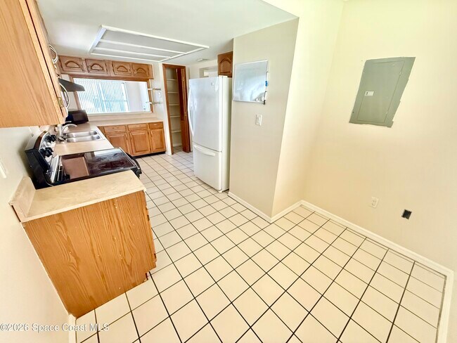 Building Photo - 5650 N Banana River Blvd