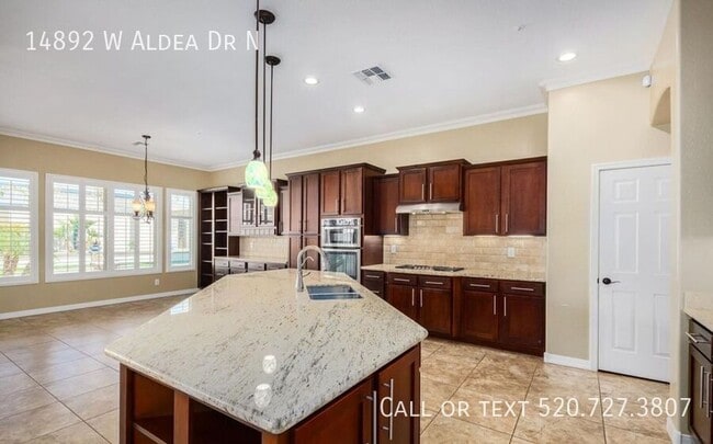 Building Photo - 14892 W Aldea Dr S