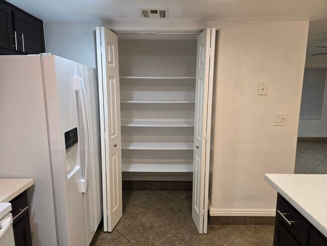 Building Photo - UPGRADED CONDO READY TO MOVE INTO!