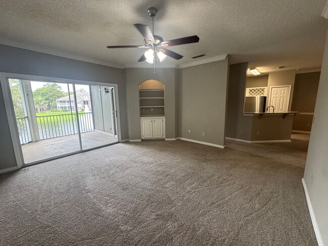 Building Photo - Sail Cove 2/2 Upstairs Condo Available Now!