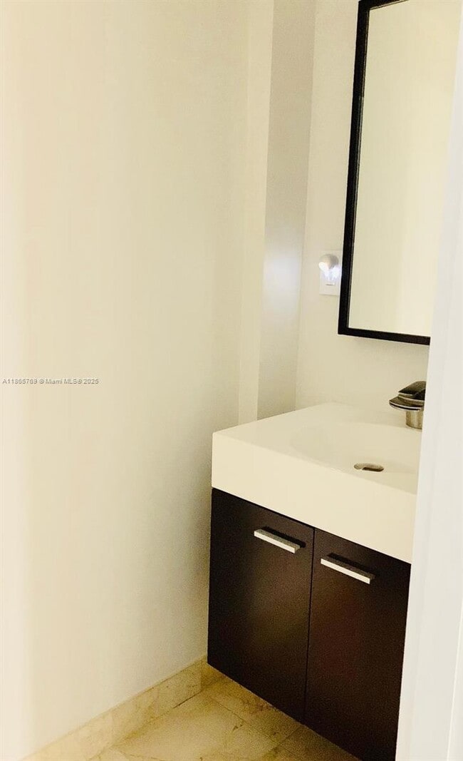 Building Photo - 6917 Collins Ave