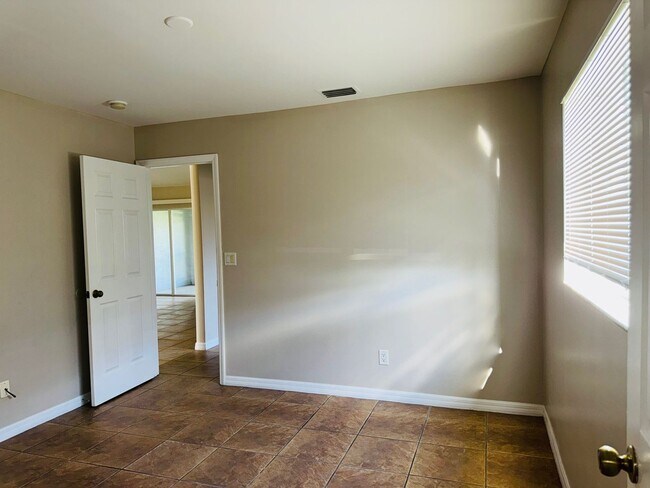 Building Photo - Experience this Cape Coral 3 bedroom 2 bath corner duplex with 1 car garage and screened in lanai.