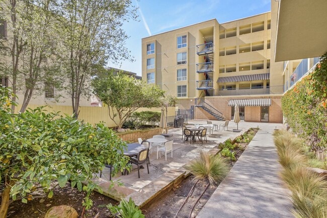 Building Photo - Modern Living Meets Urban Charm in Bankers...