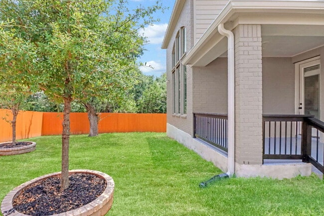 Building Photo - "Spacious 4-Bedroom Sanctuary with Cozy Fireplace in San Antonio's Prime Location!"