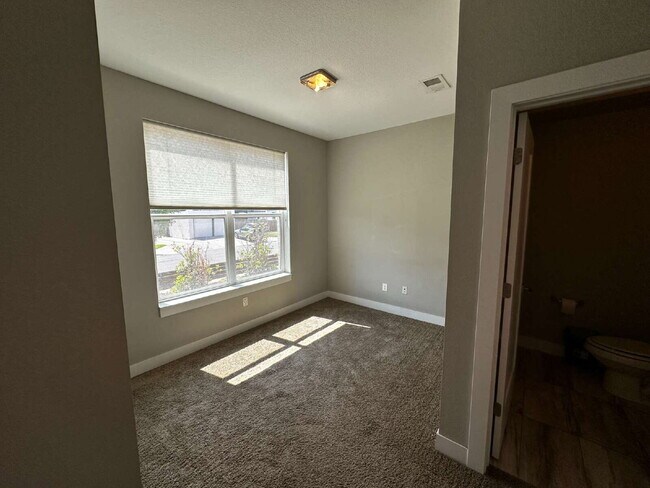 Building Photo - "Experience Modern Comfort: Spacious 2-Bed...