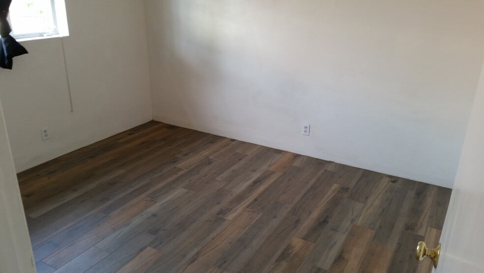 Porcelain plank tile floor - 528 N Olsen Ave