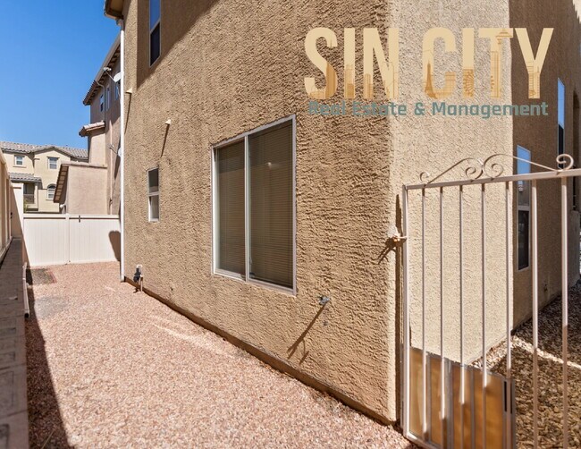 Building Photo - "Charming 3-Bed Oasis with Granite Elegance on Gingerbread Man Ave, Las Vegas!"
