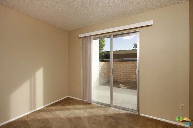 Building Photo - Spacious 4-Bedroom Condo in Indian Canyon ...