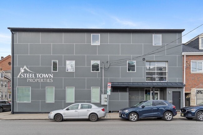 Building Photo - MASSIVE MODERN RENOVATION WITH OPEN LAYOUT...