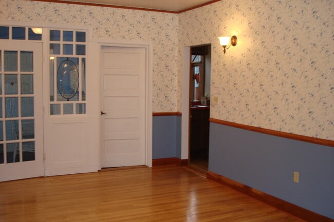 Dining Room, Door to Sunroom on left, entrance to Butler's Pantry on Right - 3402 N 28th St