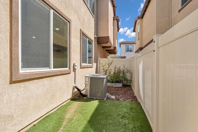 Building Photo - 1704 Cal Orchid Pl