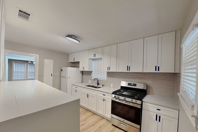 Building Photo - Completely Remodeled Charm with a Huge Backyard & Bonus Room!