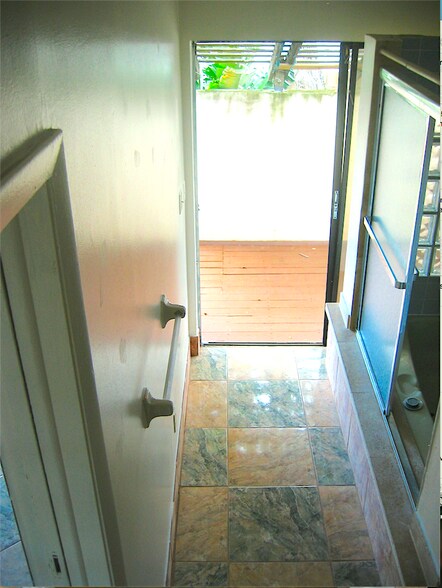 West bedroom bathroom view out to patio - 4210 SW 51st St