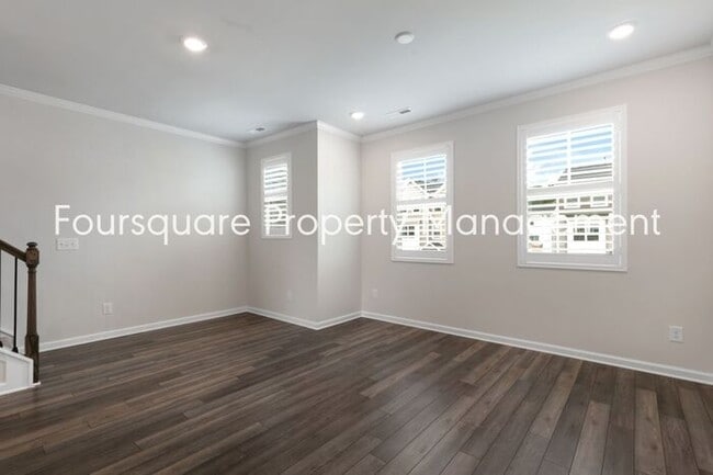 Building Photo - Stylish 3-Level Townhome with Bonus Suite, Deck & Garage – Near I-540 and Shopping