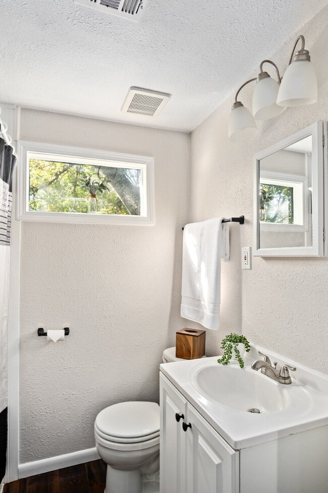 Building Photo - "Charming 2-Bedroom Duplex Retreat on Clou...