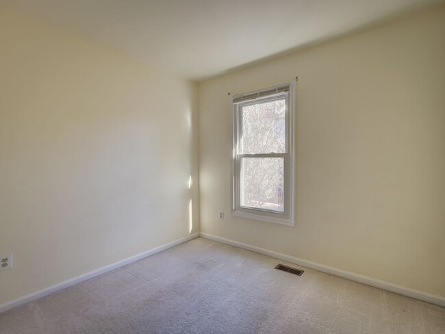 Building Photo - A Lovely Brick-Front Town House