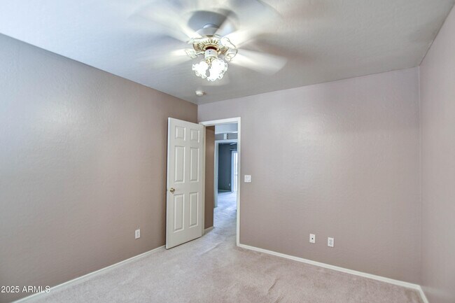 Building Photo - 6660 E Riverdale St