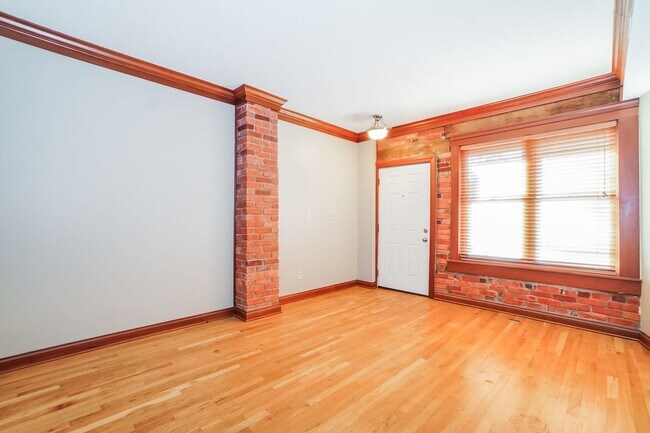 Building Photo - Charming 1-Bedroom Apartment with Exposed Brick, Hardwood Floors & Updated Kitchen