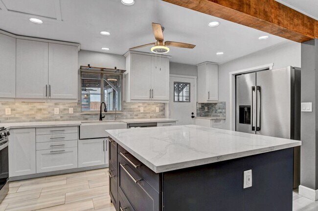 Building Photo - UNIQUE SINGLE FAMILY HOME! - No HOA, Car Lift, RV Parking and Nice Backyard