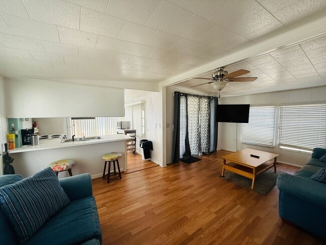 Building Photo - Beautiful fully furnished one bedroom, one bath manufactured home in a 55+ deed restricted gated ...