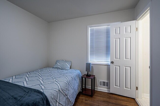 Building Photo - The Forest Haven | Large Forest Haven home with a spacious yard and deck, conveniently located ju...