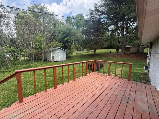 Building Photo - 2-Bedroom Home with Bonus Room & Large Wooden Deck | Pet-Friendly Near I-40 & City Lake