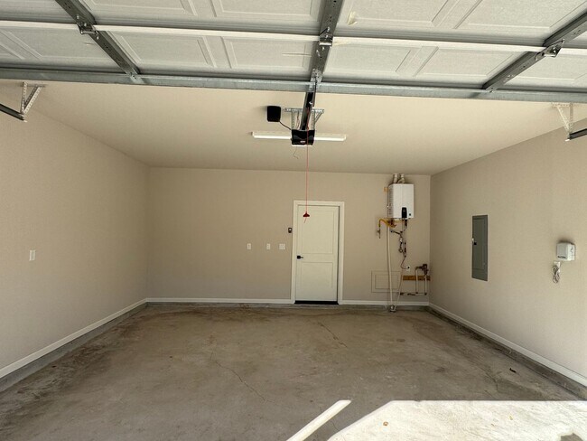 Building Photo - BRAND NEW - 4 bed - 3 bath - 2 car with fenced yard!