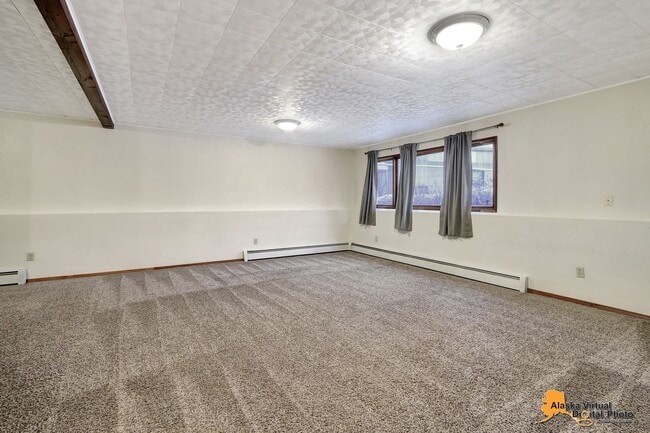 Building Photo - Spacious Home with Garage & Fenced Yard Near JBER & Major Hospitals