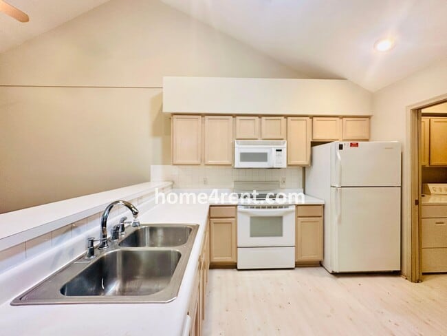 Building Photo - Maintenance FREE, Ranch Style Townhome w/ ...