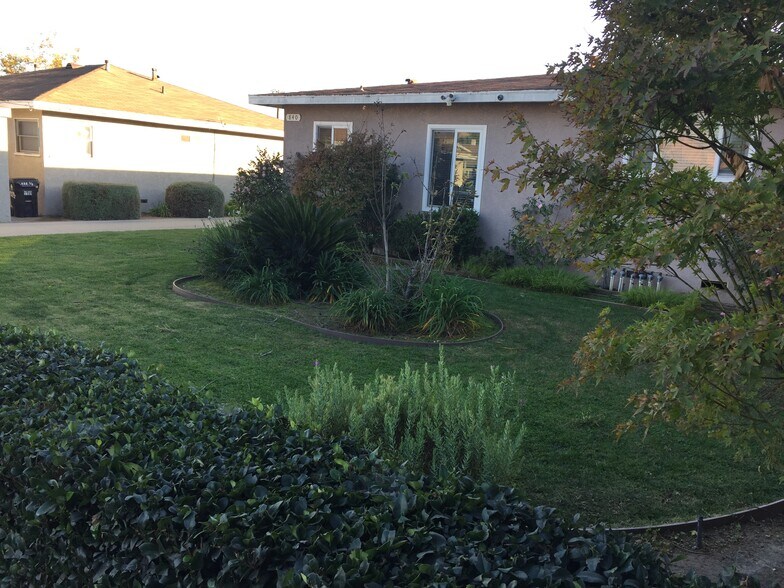 View of landscaping at front of property. - 840 W 168th St