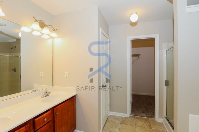 Building Photo - Move in before February 15th and choose your reward: a $250 Amazon Gift Card or a 55" Smart TV!